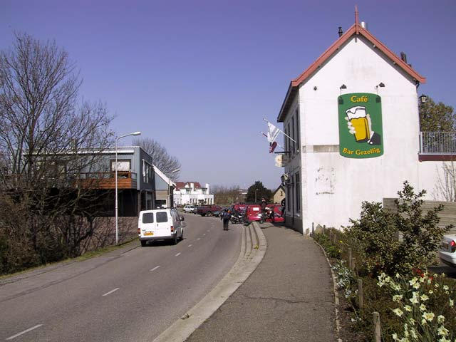 Op muur geschilderd: Cafe Bar gezellig